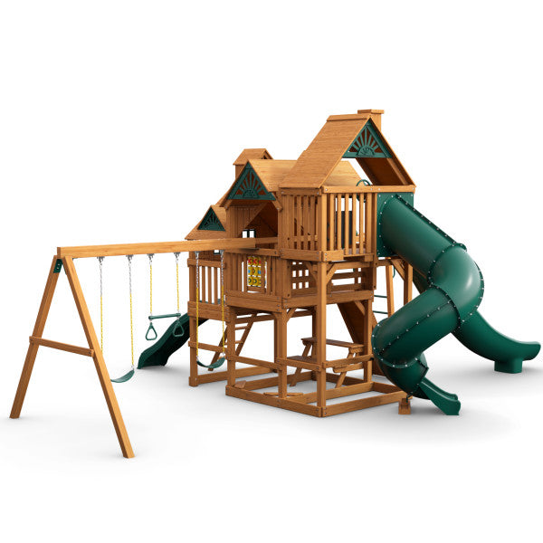 Cedar wooden playset with three decks, green tube slide, swings, rock climbing wall, and picnic table