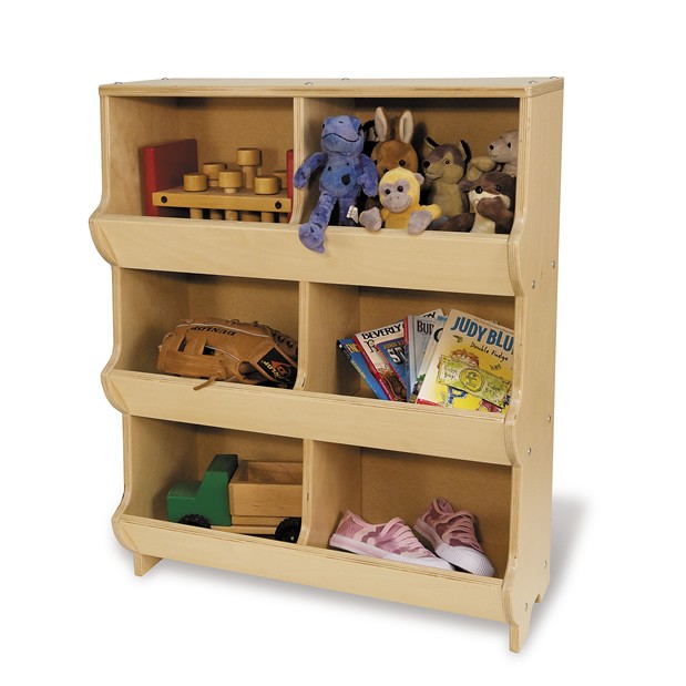 Hardwood children's storage rack with angled front panels holding toys, books, shoes, and a baseball glove