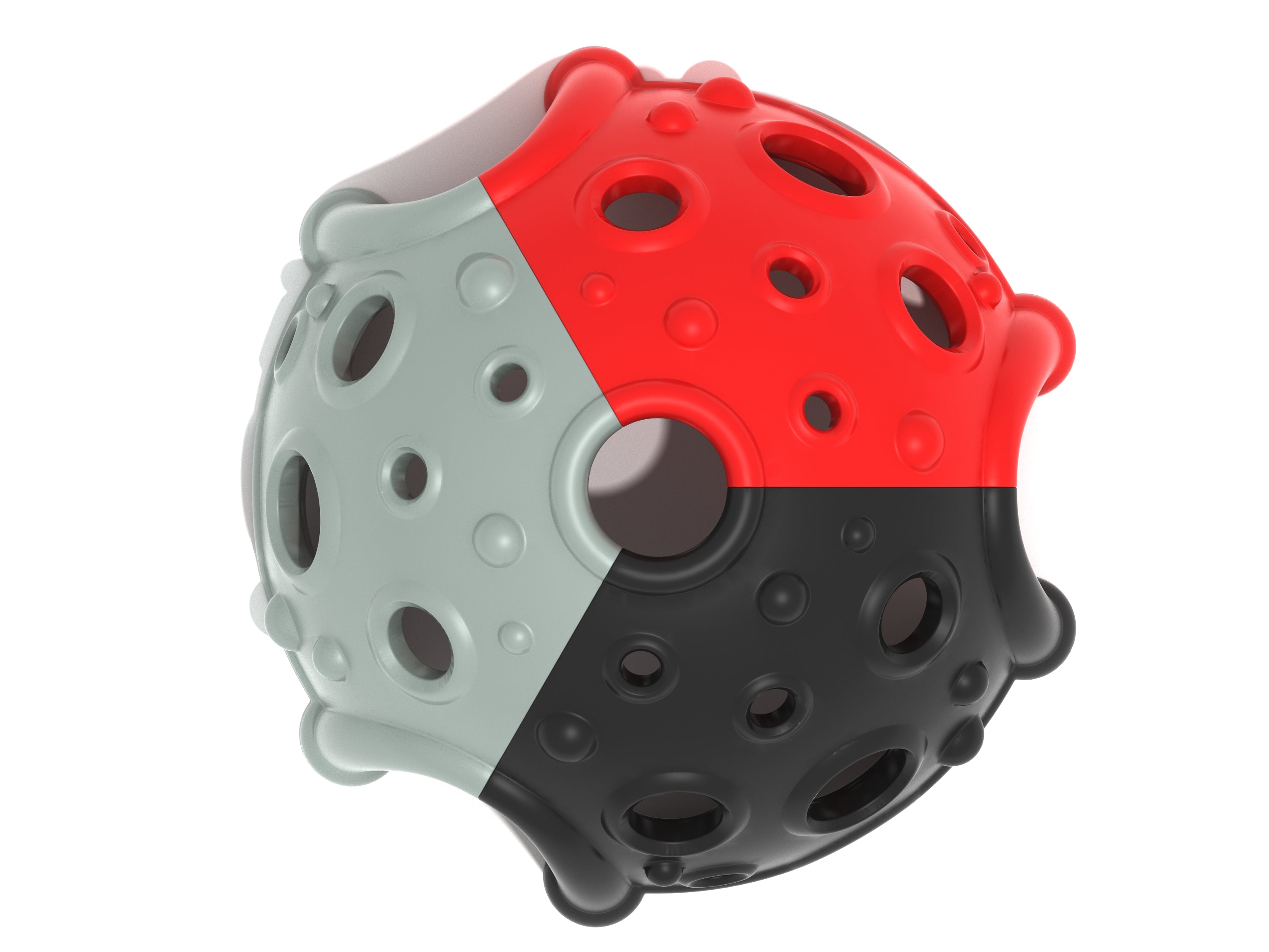 Overhead view of a multi-colored climbing dome with red, black, and gray panels featuring circular holes and rounded climbing grips