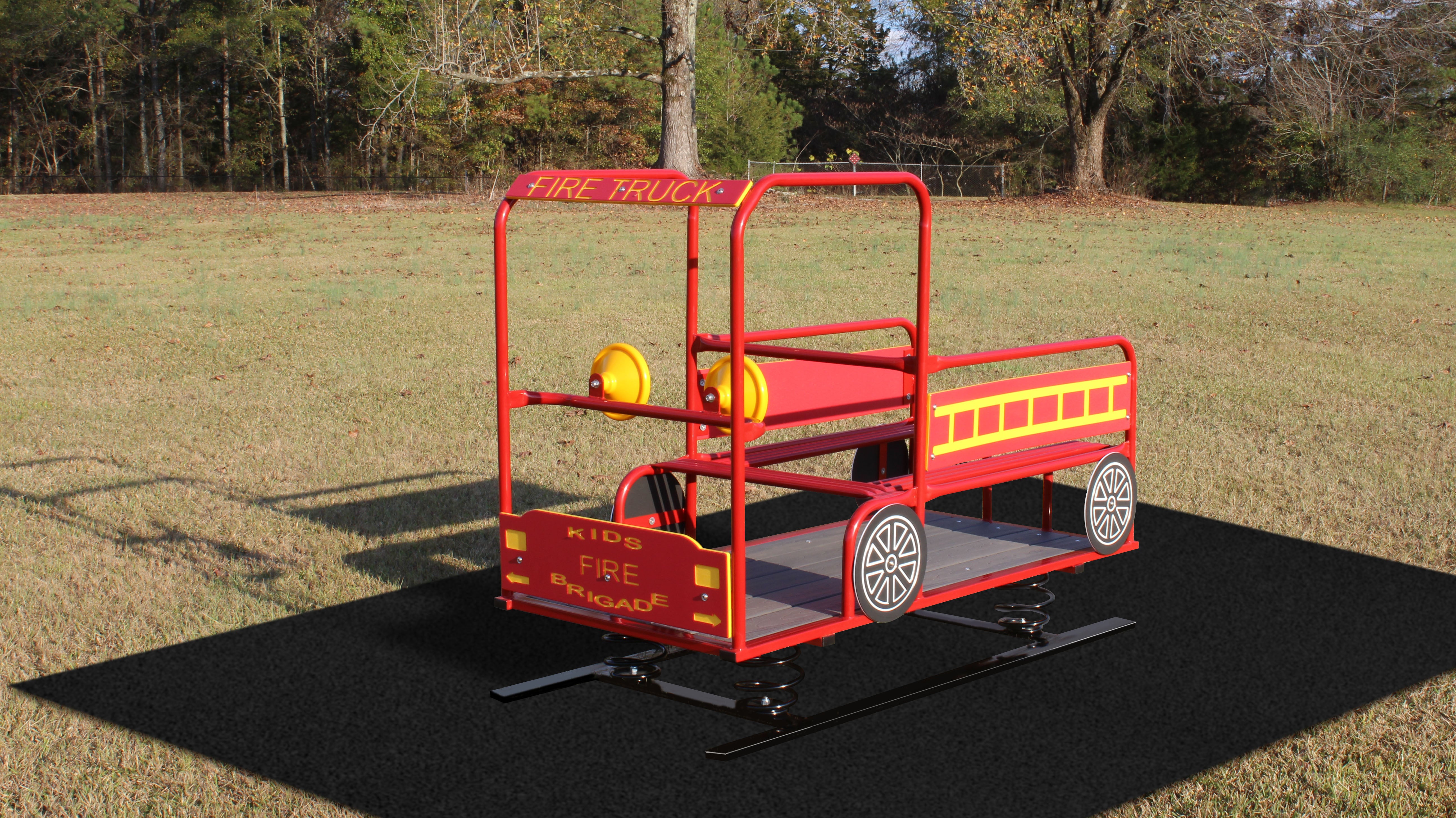 Red multi-passenger fire truck spring rider playground equipment with yellow ladder and steering wheels on black safety mat