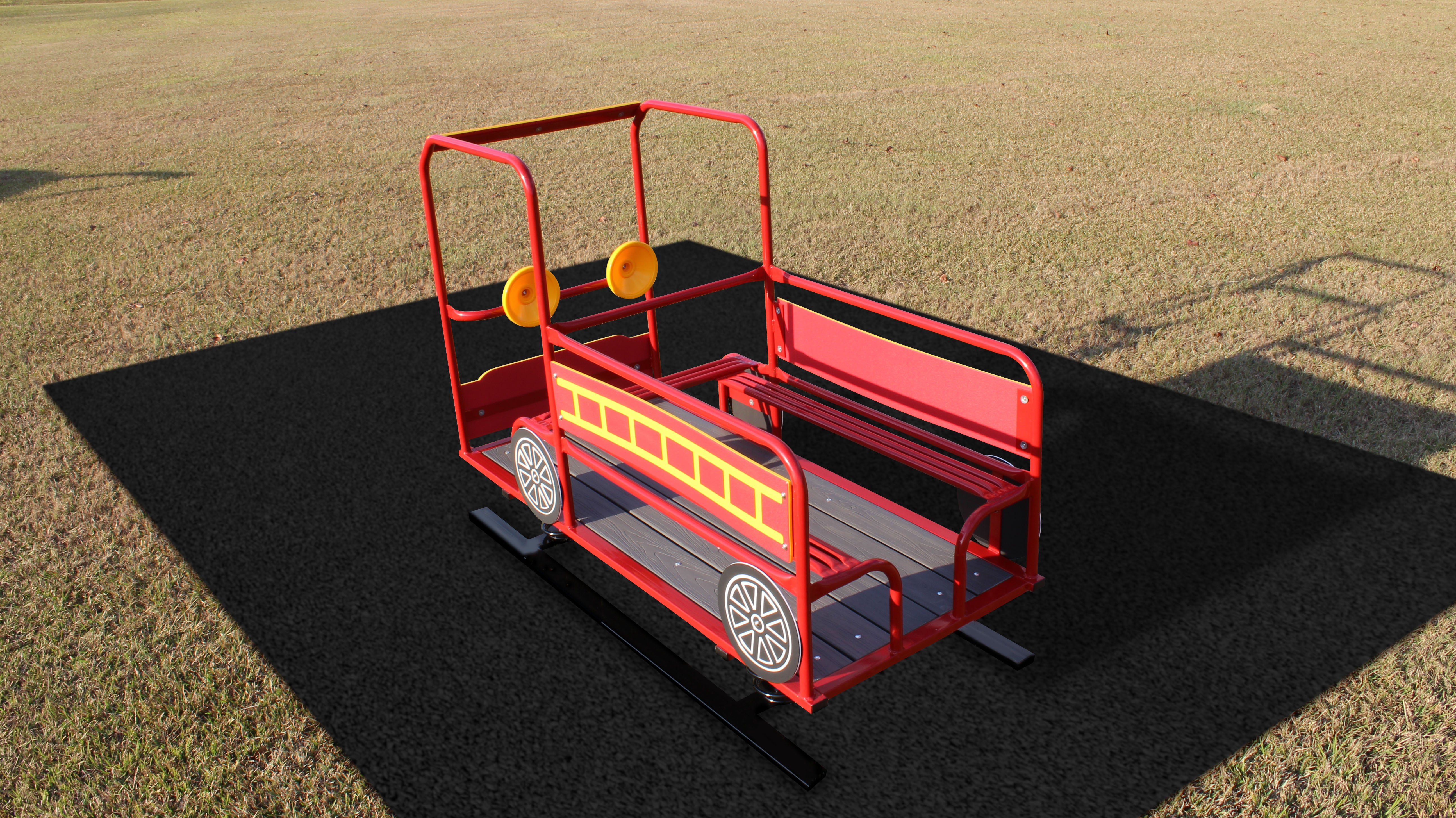 Red multi-passenger spring rider shaped like a fire truck with yellow ladder graphics and black wheels on playground surface
