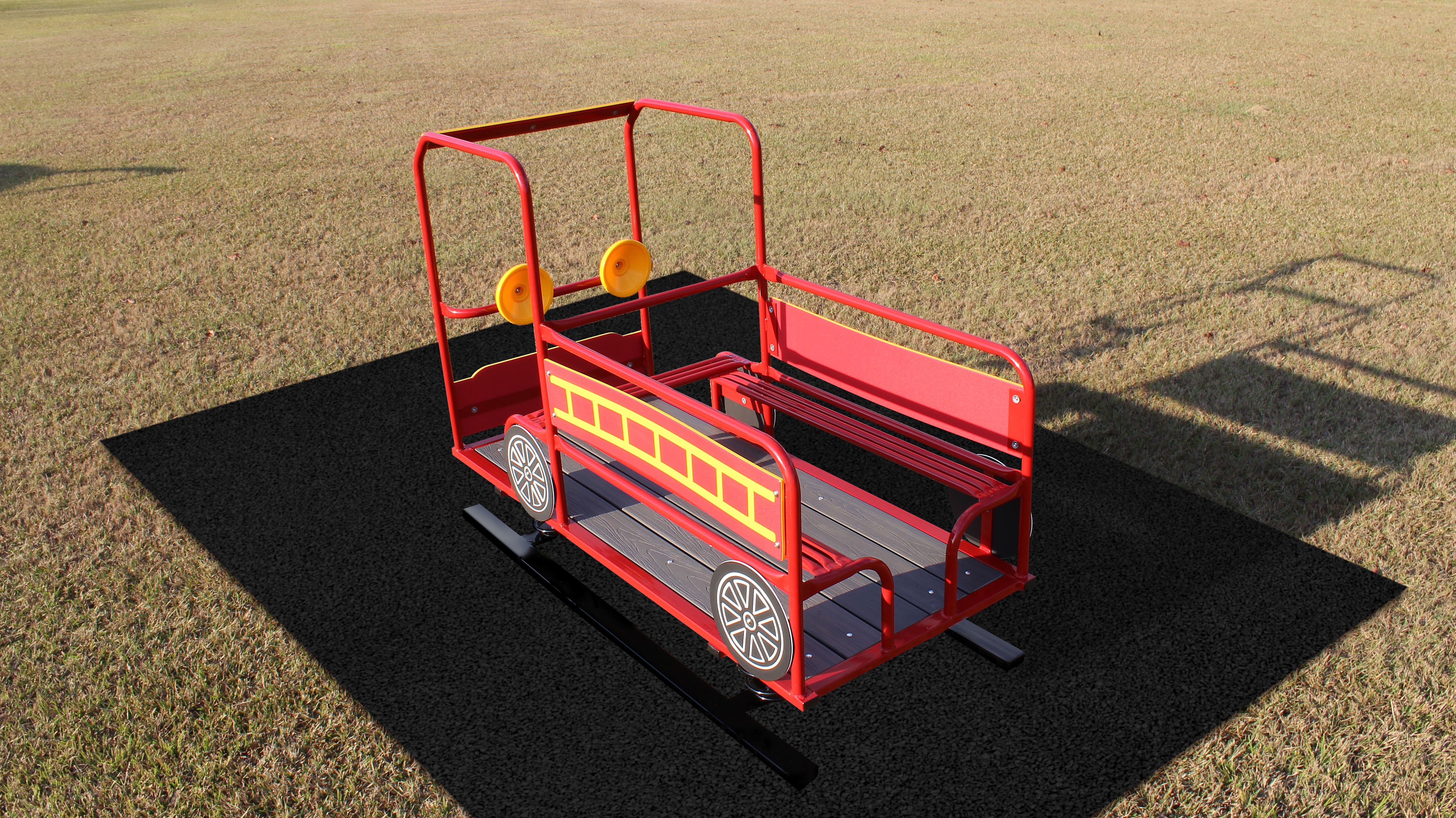 Red fire truck-shaped multi-passenger spring rider with yellow ladder graphics and steering wheels on playground surface