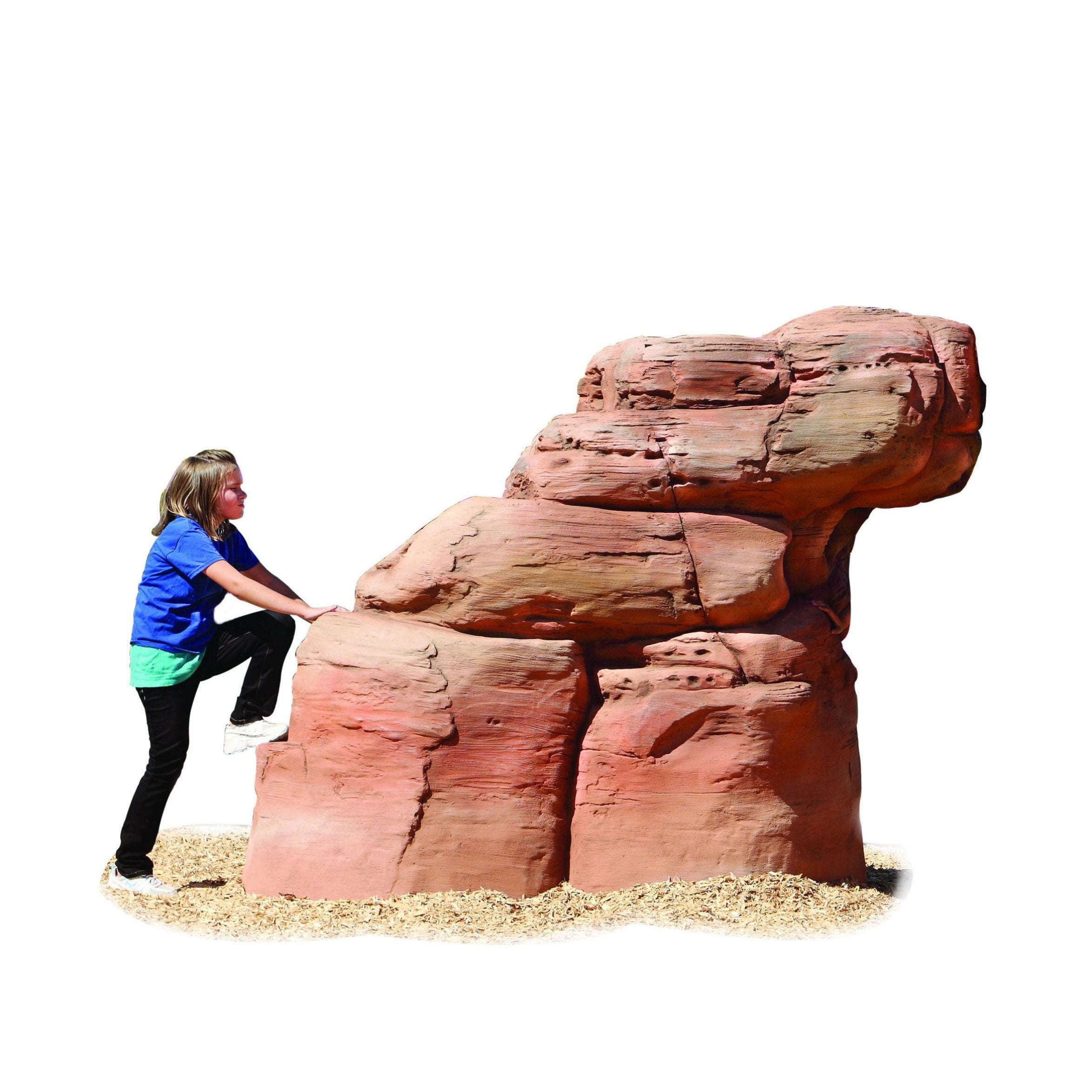 Child climbing medium sandstone climbing boulder with realistic textured surfaces on wood chip ground