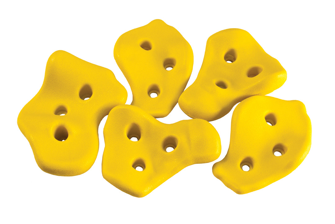 Five textured yellow climbing holds with multiple mounting holes for playset rock wall installation