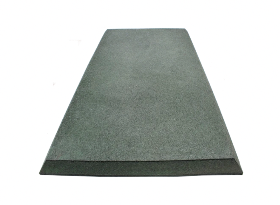 Green rubber safety mat with beveled edge designed for playground swing areas and high-traffic surfaces