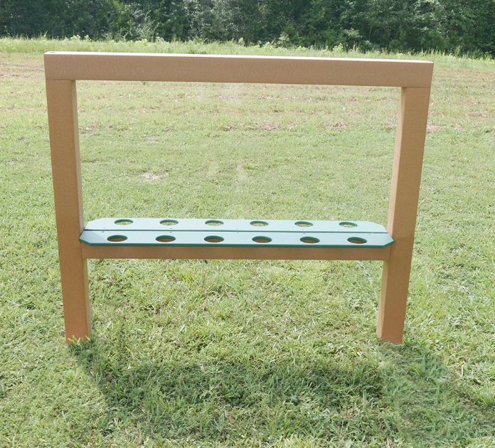 Outdoor group art easel panel with multiple paint cup holders and sturdy frame on grassy playground area