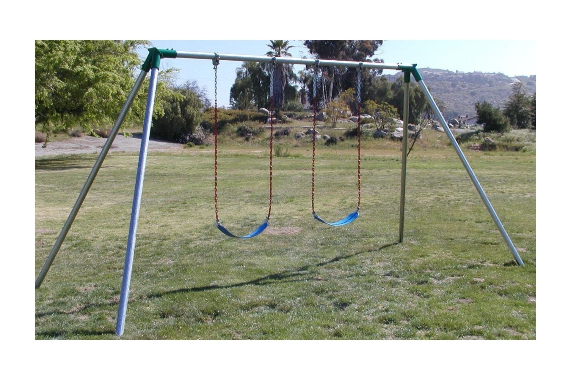 Standard 10 Foot High Residential Swing Set with metal frame and two blue swing seats on grassy field