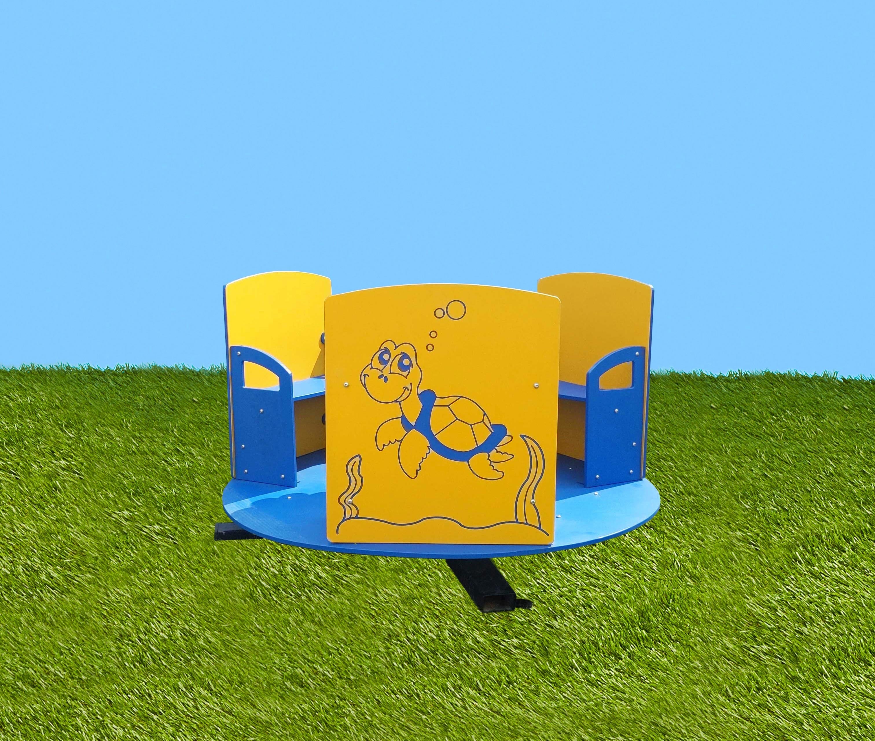 Colorful children's playground spinner with blue base, yellow panels, and ocean animal illustrations on seats and panels