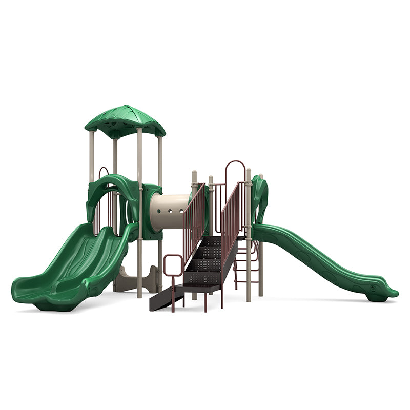 Playground structure with neutral leaf roof, double and single green slides, crawl tunnel, rock climber, and stairs.
