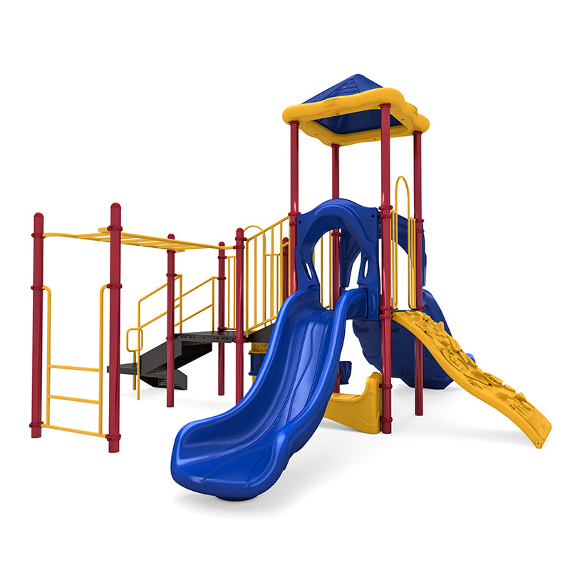 Colorful playground structure with double blue slides, yellow climbing wall, red posts, overhead monkey bars, and musical bongos.