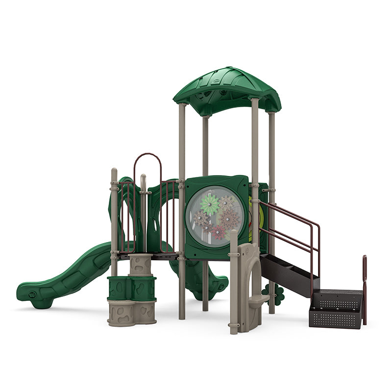 Children's playground structure with green roof, two straight slides, trunk climber, stairs, ADA transfer station, rain wheel, and interactive counter panel