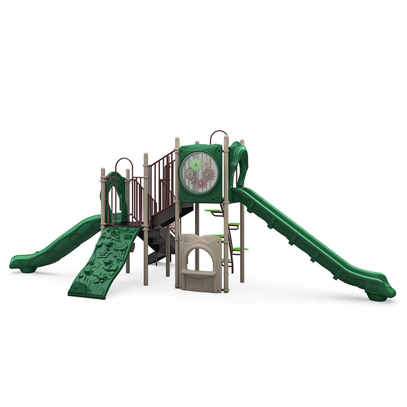 Green and beige playground structure with two slides, climbing wall, gear panel, and ladder for children’s play