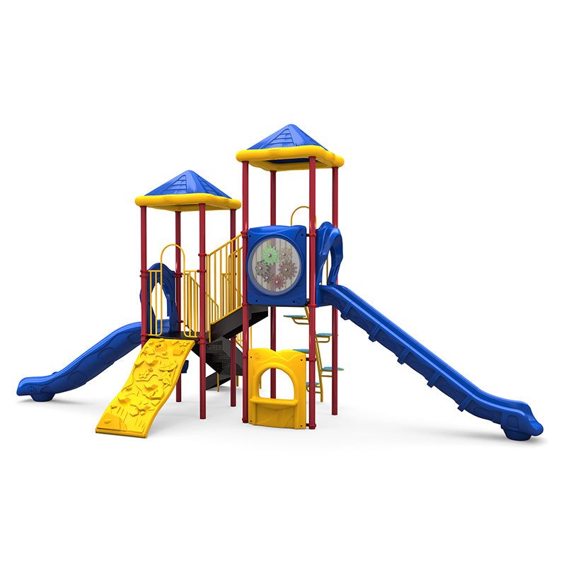 Colorful playground structure with two blue slides, yellow climbing wall, gear panel, and red support posts.