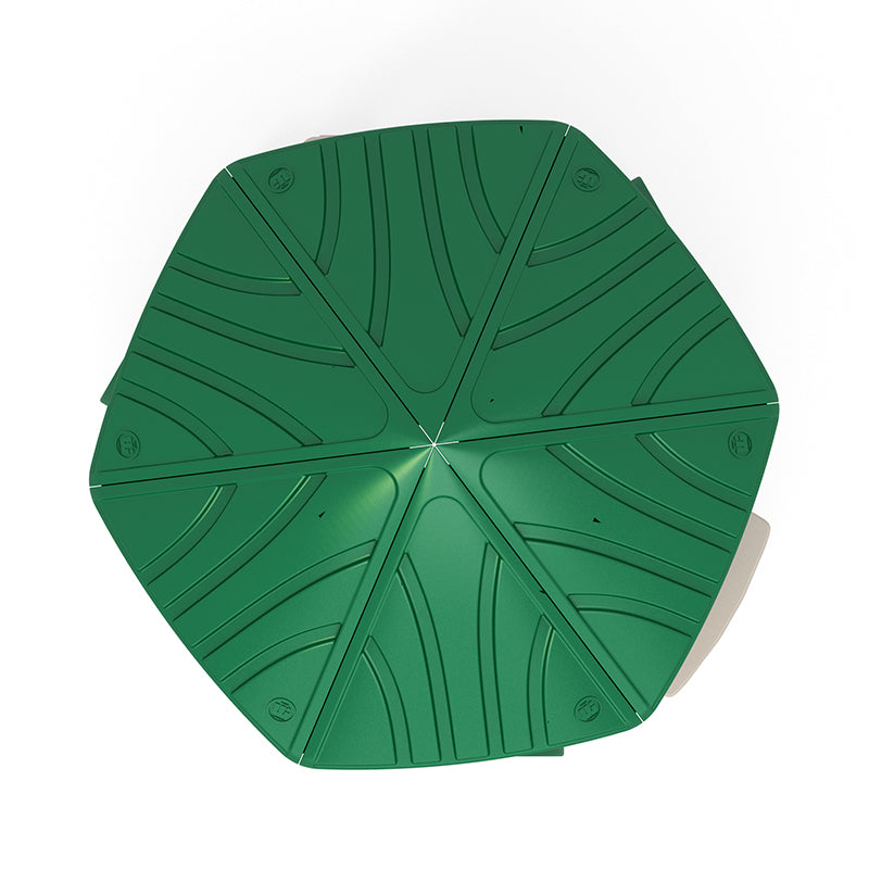 Overhead view of a green hexagonal playground platform with textured curved line patterns on each segment