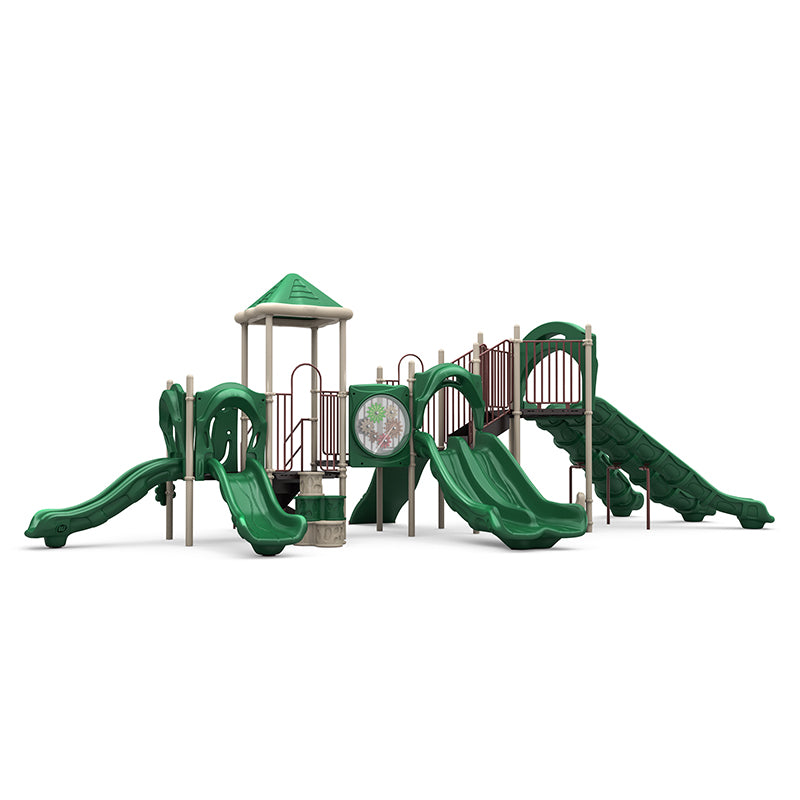 Green commercial play system with double and single slides, rock climber, gear panel, canopy roof; multi-level design.