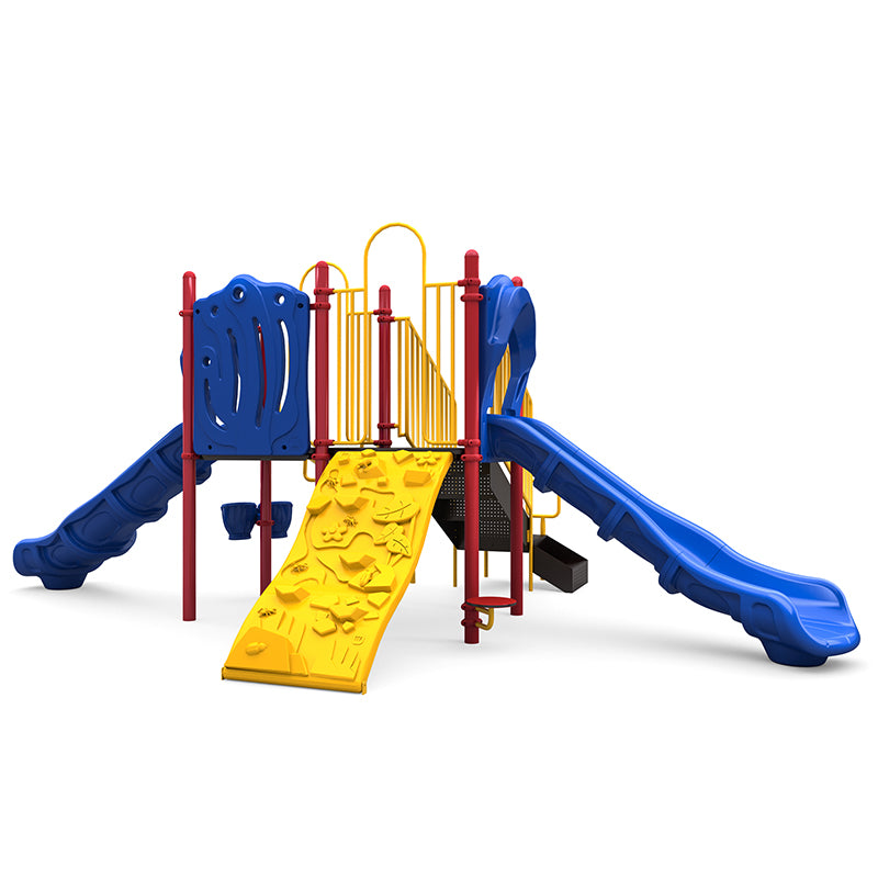 Colorful playground structure with two blue slides, yellow climbing wall, red support posts, and interactive play elements.