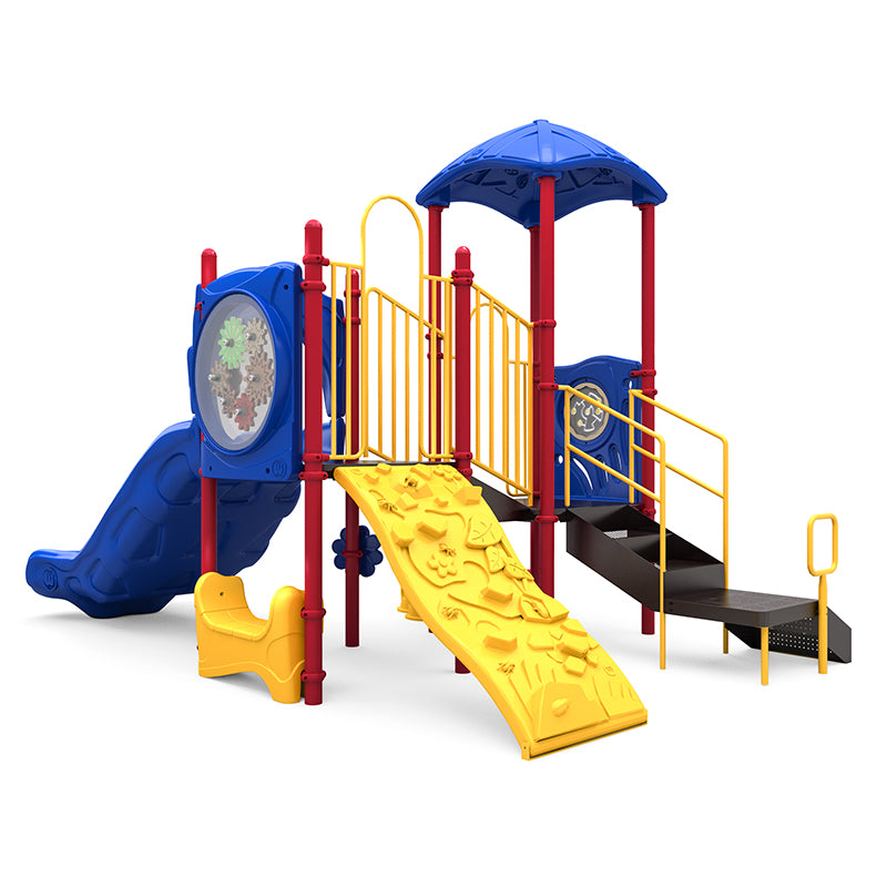 Colorful playground structure with double slide, climbing wall, gears panel, maze panel, rain wheel, and covered platform