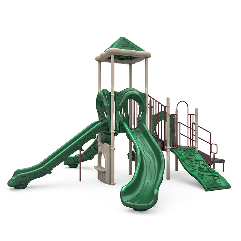 Green and beige playground structure with pyramid roof, four slides, rock climbing wall, stairs, and musical bongos for outdoor play