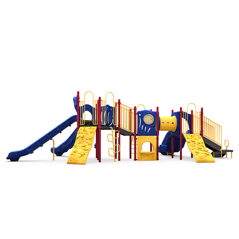 Colorful playground structure with sectional, double, and single slides, climbing walls, crawl tunnel, and safety railings.
