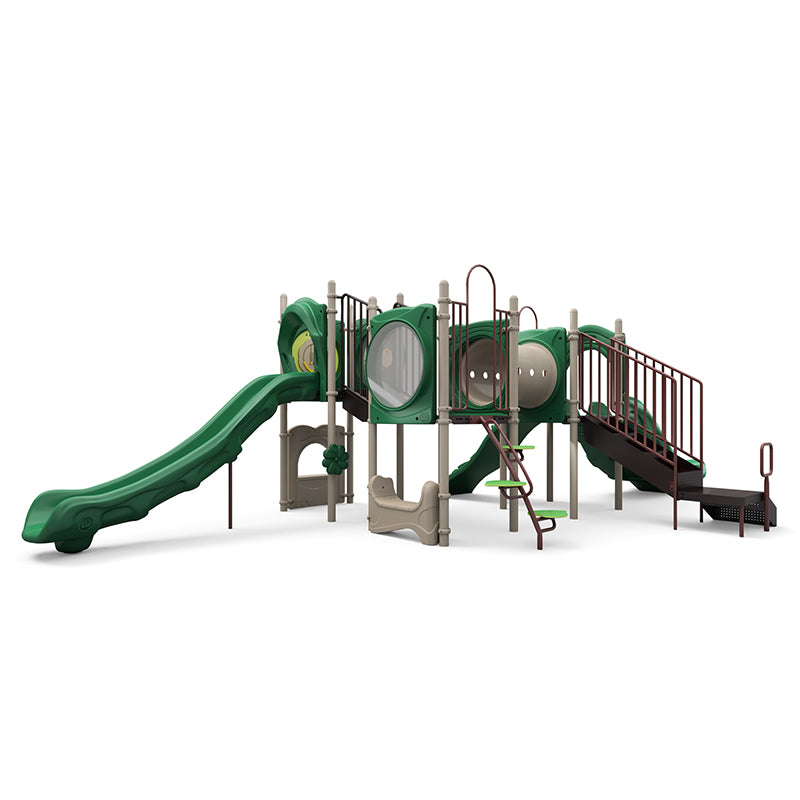 Green and beige playground structure with single and double slides, climbing features, interactive panels, and a rain wheel.