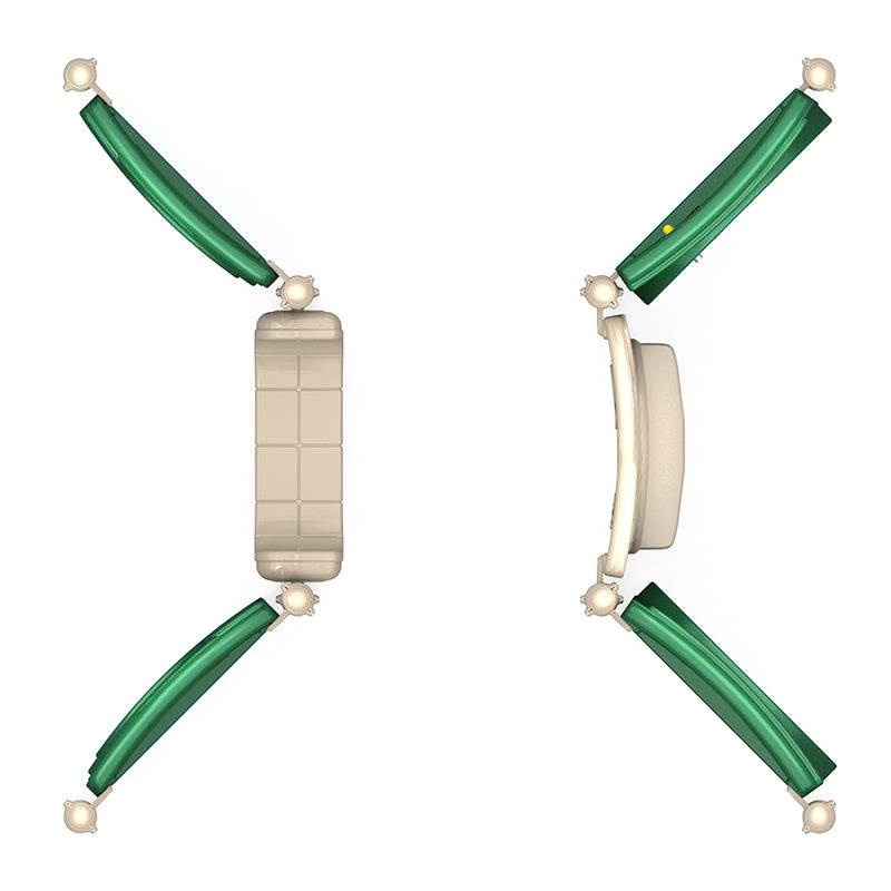 Overhead view of a playground structure with beige platforms, green slides at four corners, and interactive play panels