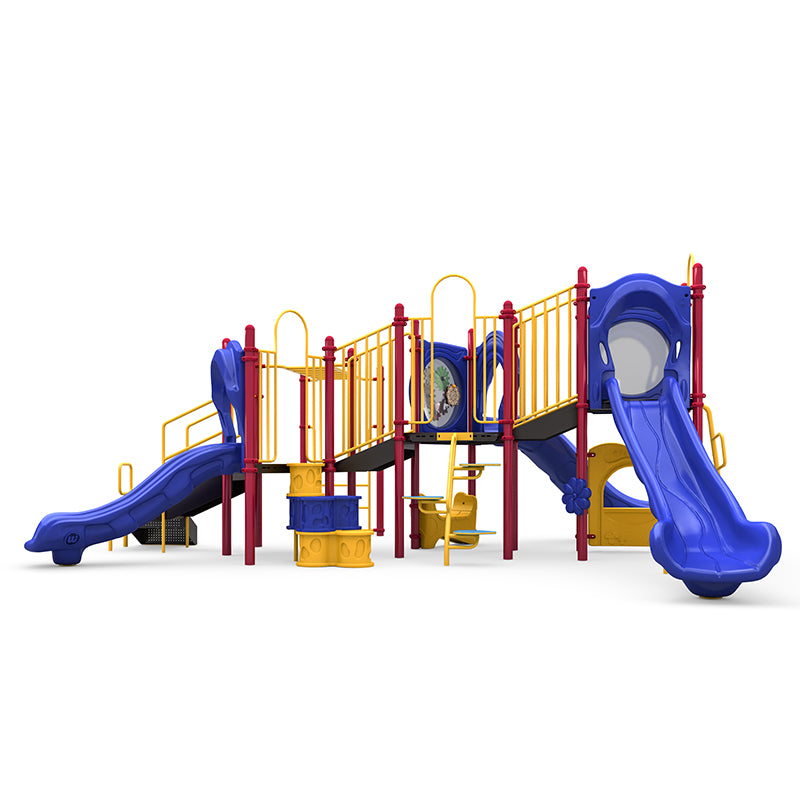 Colorful playground structure with three blue slides, yellow railings, climbing elements, and interactive gear and rain wheel panels.