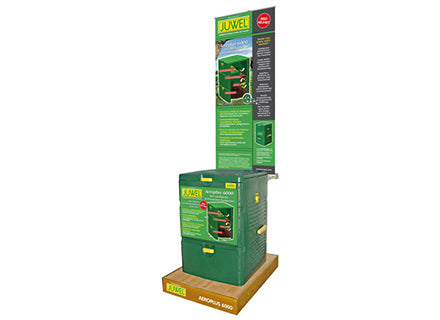 Vertical green multi-stage compost bin with hinged lid, crank handle, ventilation system, and wooden base for efficient organic waste processing