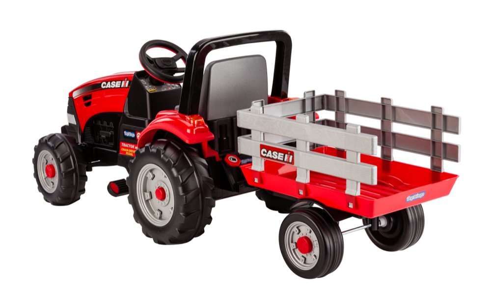 Red pedal-powered tractor with large black wheels and detachable gray stake-side trailer