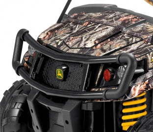John Deere Gator XUV ride-on with Realtree camo pattern, black brush guard, and large dump bed with tailgate