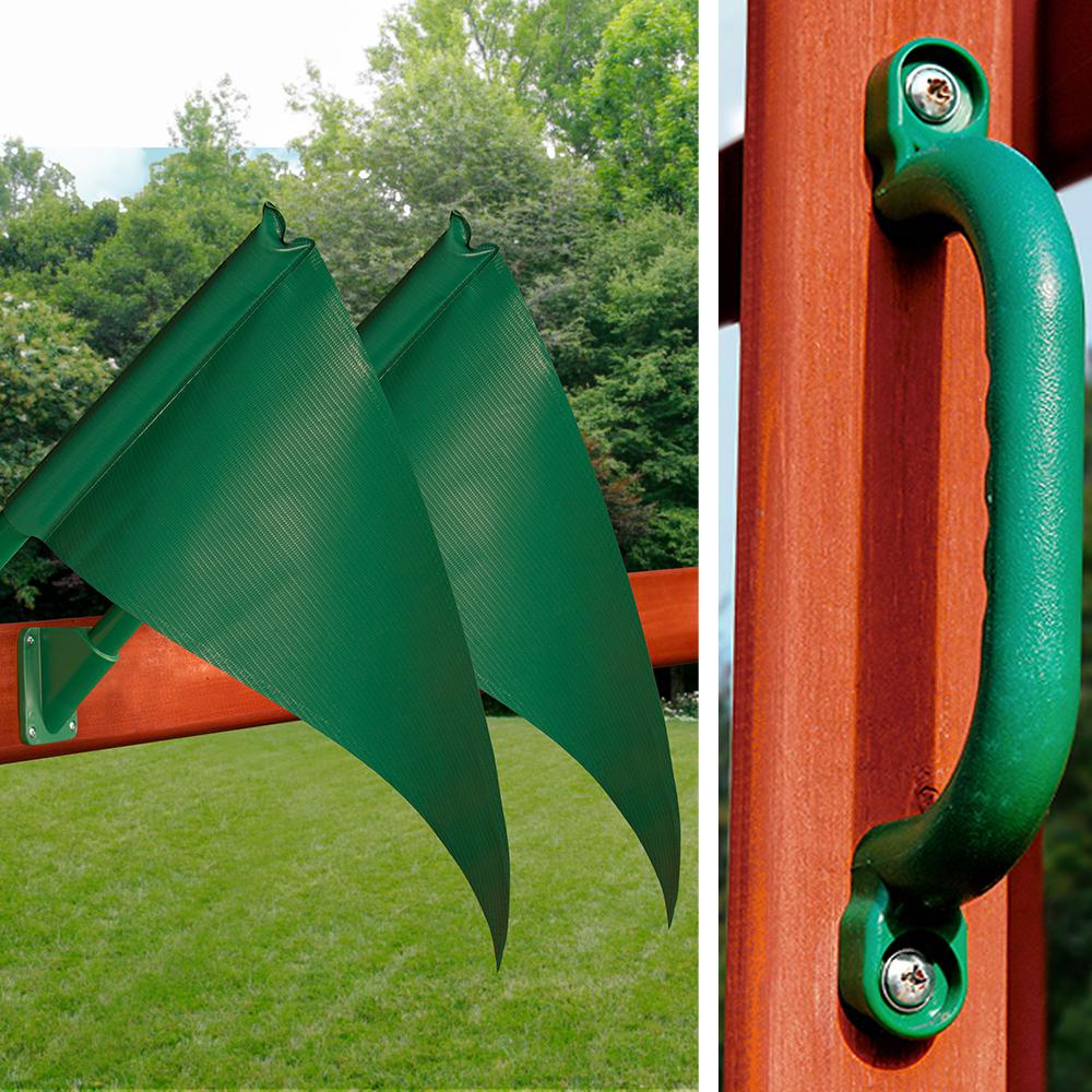 Green plastic flags mounted on amber-stained wooden playset railing with textured green handle detail