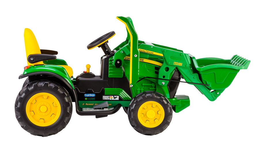 Green and yellow electric ride-on tractor with front loader, adjustable seat, and large traction wheels for kids