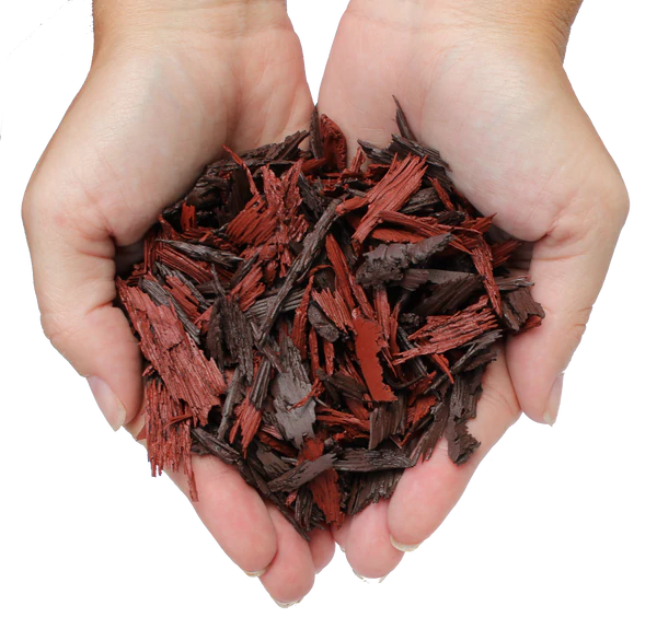 Hands holding Loose Fill Rubber Mulch with red and dark brown recycled rubber pieces for playground surfacing and landscaping