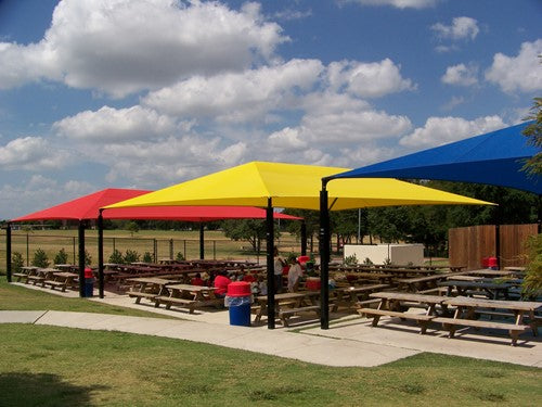 Hip Roof Shade Structure with 4 Posts and 8 Foot EntryShades in red, yellow, and blue over picnic tables in outdoor park setting