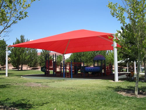 Red rectangular hip roof shade structure with four posts covering playground equipment and picnic area