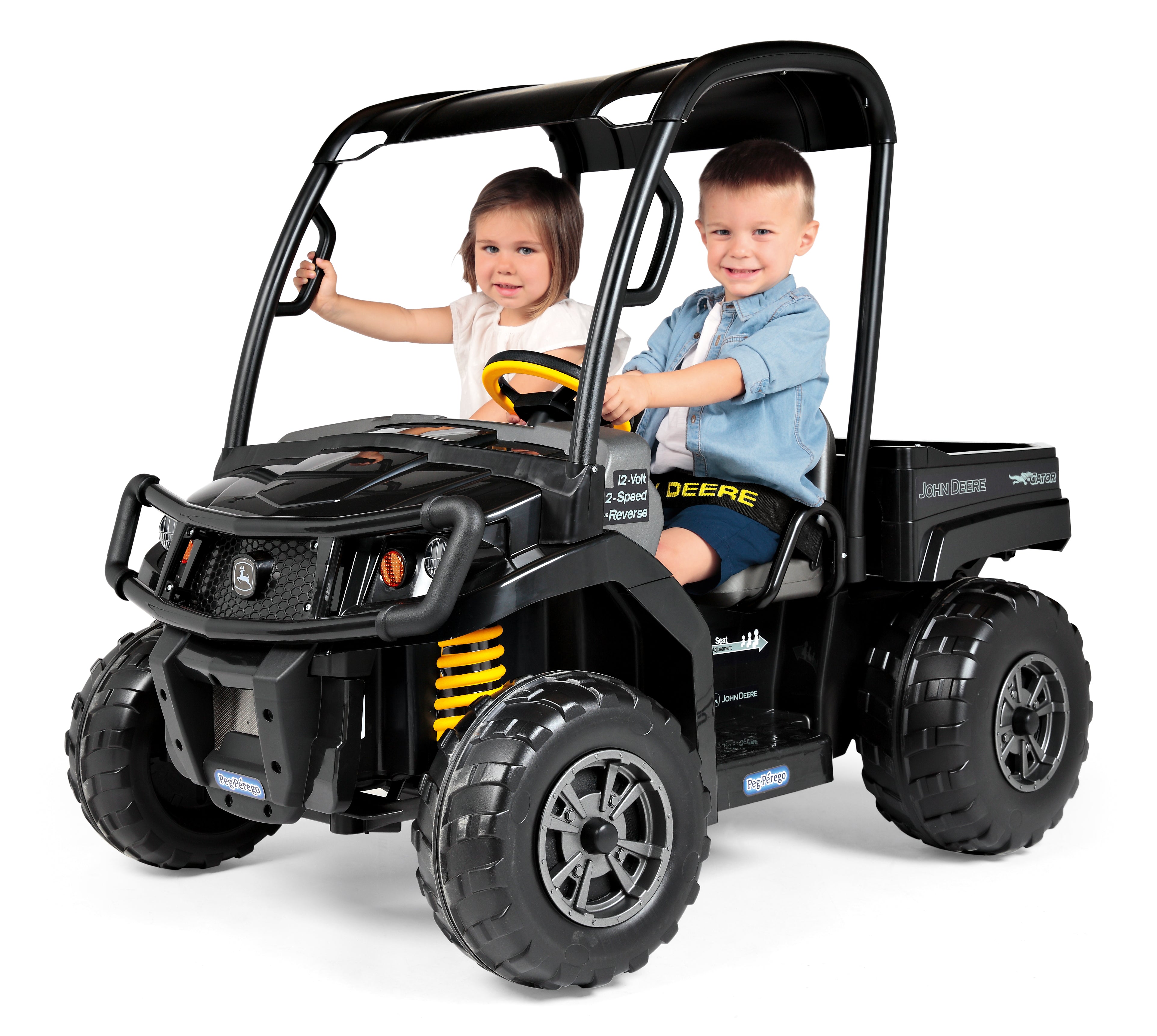 Black ride-on utility vehicle with roof, rugged wheels, yellow steering wheel, and two children seated inside