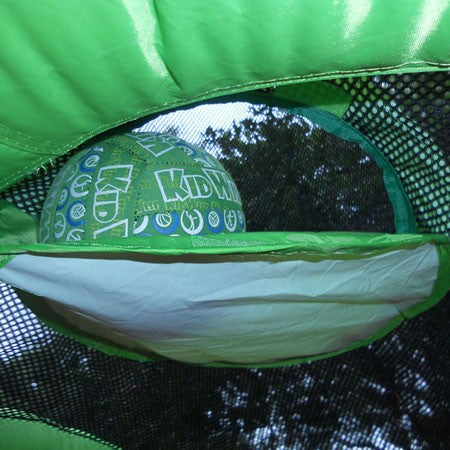 Inflatable sports bounce house with basketball hoop and green neoprene ball inside mesh netting