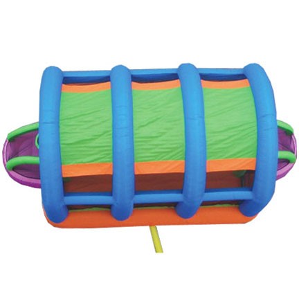 Overhead view of colorful inflatable sports bounce house with blue arches, green, orange, and purple panels, featuring soccer goals and basketball hoops