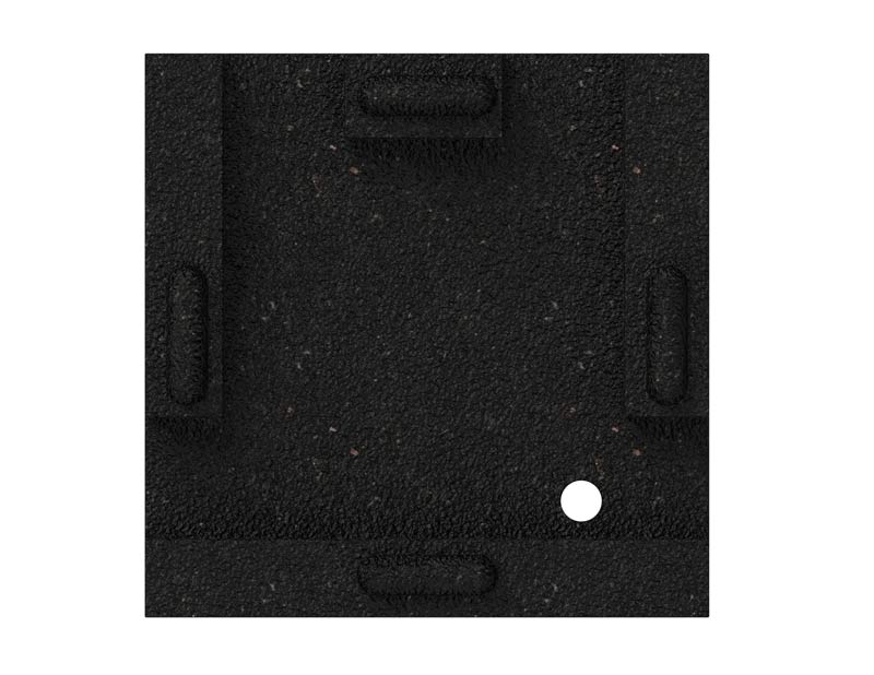 Overhead view of a black textured plastic leveling block with raised grips and a circular hole for swing set support