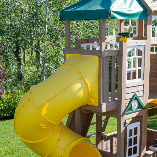 Wooden two-level playset with green canopy, yellow twist slide, play telescope, decorative windows, and swings