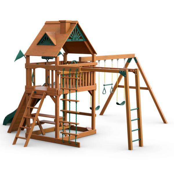 Cedar wooden swing set with green vinyl canopy, rock climbing wall, rope ladder, monkey bars, trapeze, two belt swings, and slide