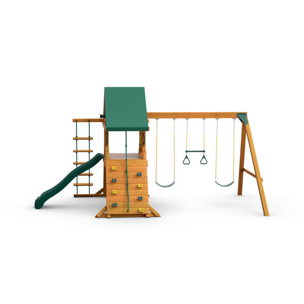 Cedar wooden playset with green vinyl canopy, rock climbing wall, wave slide, ladder, two belt swings, and trapeze bar