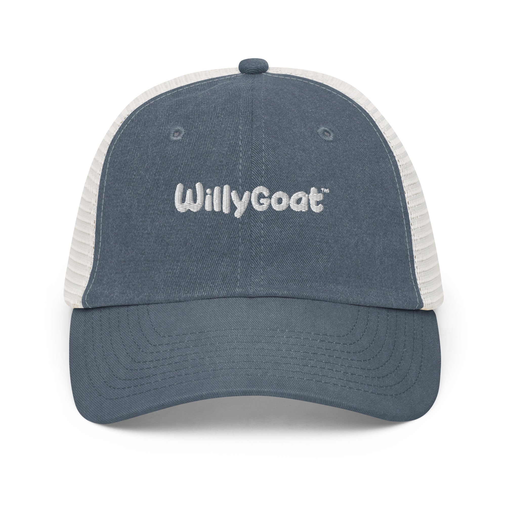 Navy blue pigment-dyed low-profile trucker hat with white mesh back and curved visor, vintage washed look