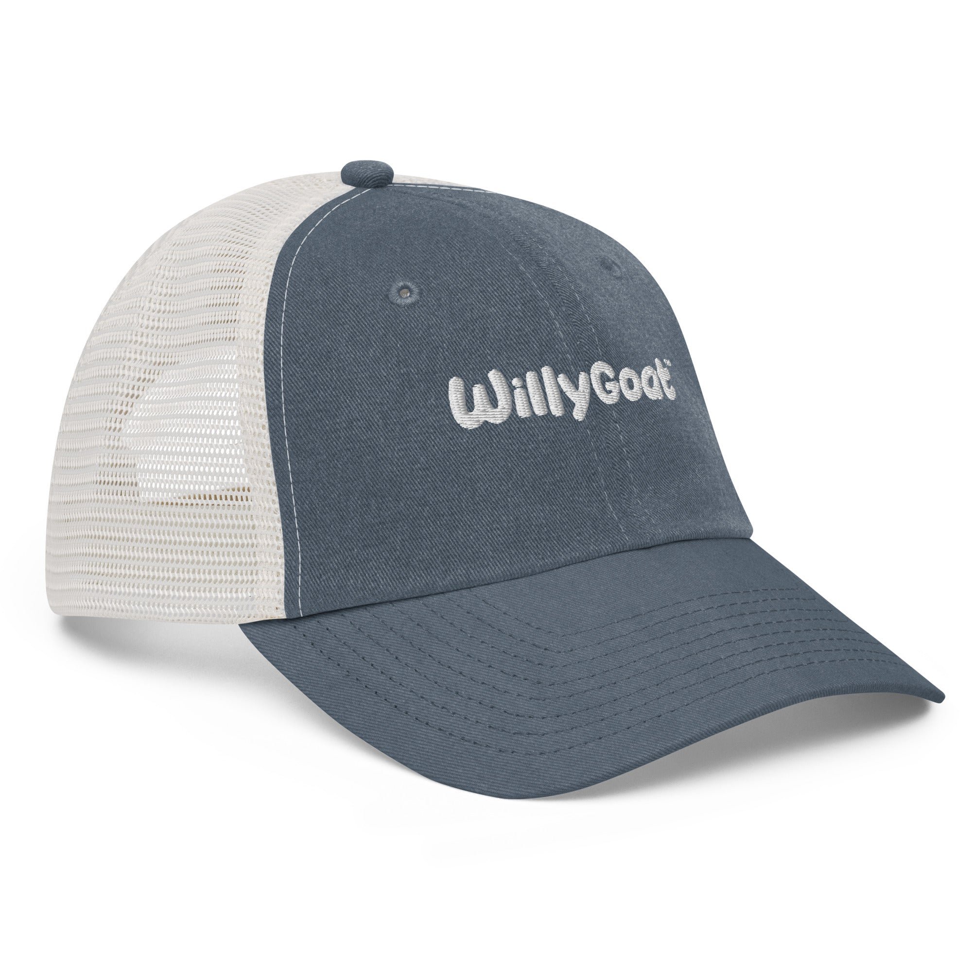 Navy blue pigment-dyed trucker hat with white mesh back, curved visor, and embroidered logo on front panel