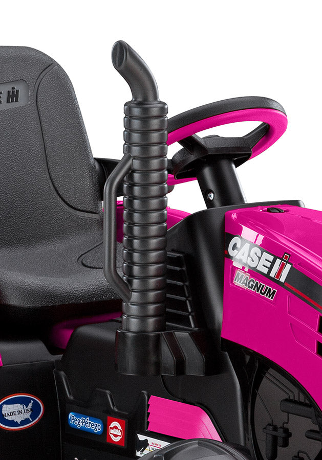 Pink ride-on tractor with black seat, steering wheel, exhaust pipe, and branded decals on the side panel
