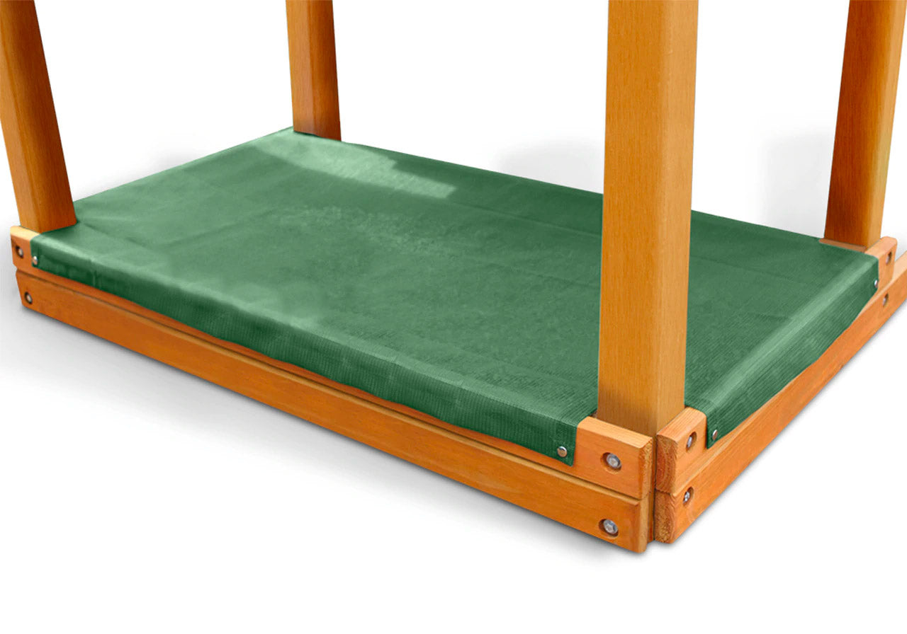 Sandbox Cover with green heavyweight laminated mesh, stainless steel snaps, and cut-out corners fitting wooden 4x4 sandbox frame
