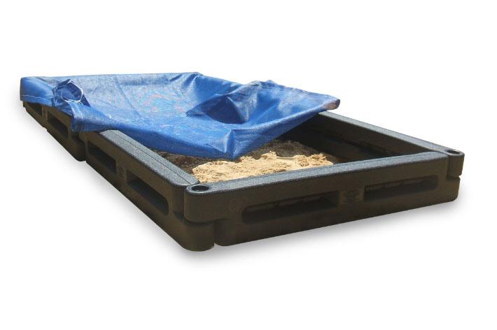 Sandbox with Cover featuring a black rectangular frame partially covered by a blue tarp, filled with sand for backyard play