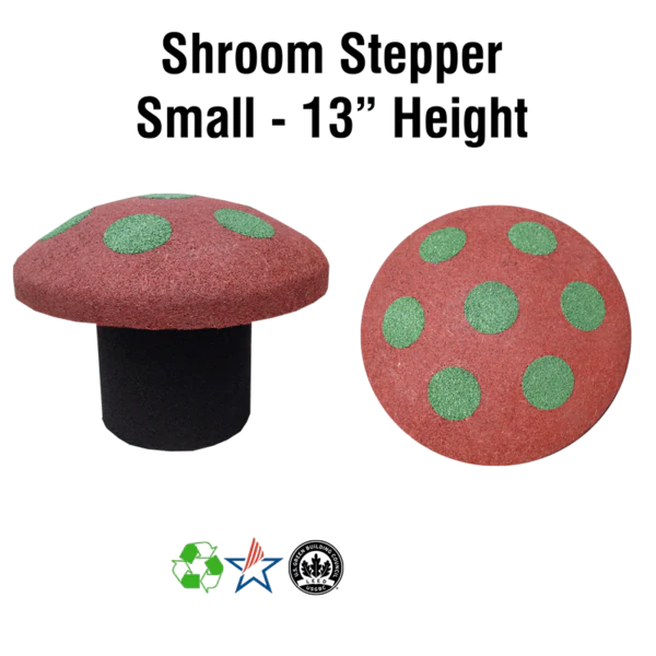 Small rubber playground stepper shaped like a red mushroom cap with green spots, weather-resistant and durable.