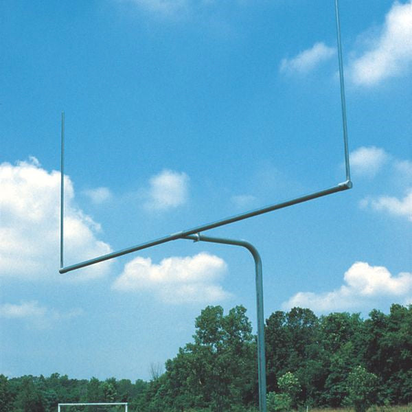 Classic single-post football goal post with bent galvanized steel support under clear sky and trees