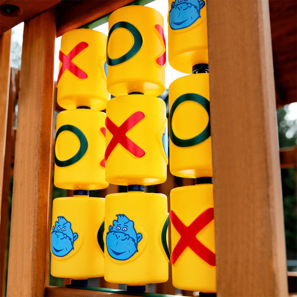 Yellow tic-tac-toe panel with red Xs, green Os, and blue gorilla faces on wooden playset panel