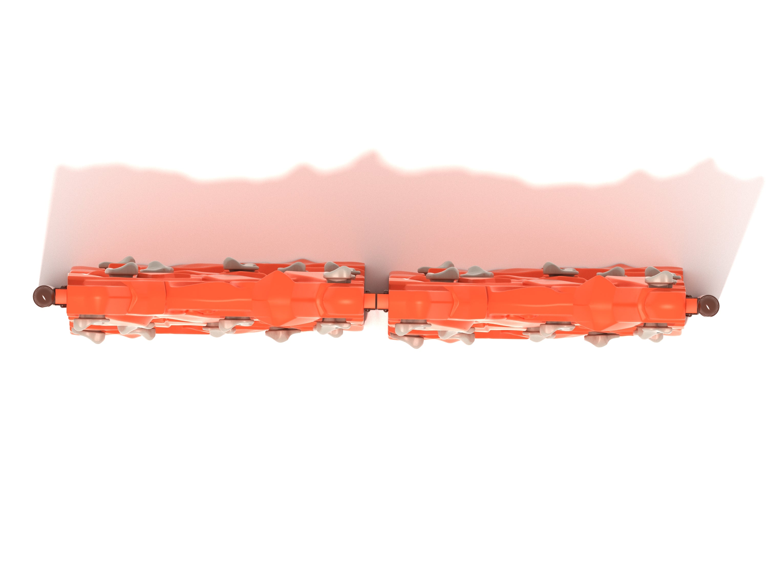 Overhead view of double parallel orange rock climbing wall with gray handholds and cut-through windows for active play